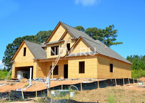 Покупка загородного дома в ипотеку: риски и сложности
